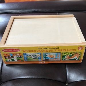 Melissa & Doug 4 twelve piece puzzle set.